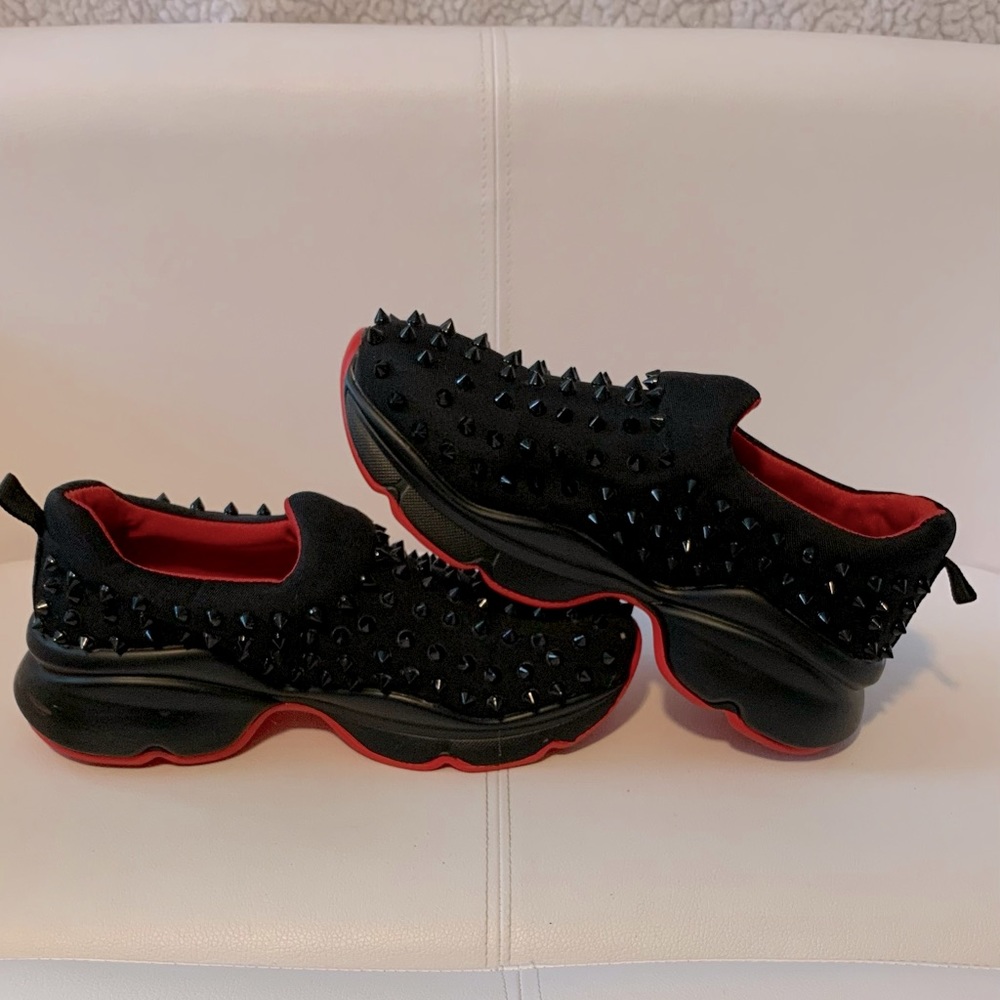 Spiked sneaker comparable to the actual redbottoms